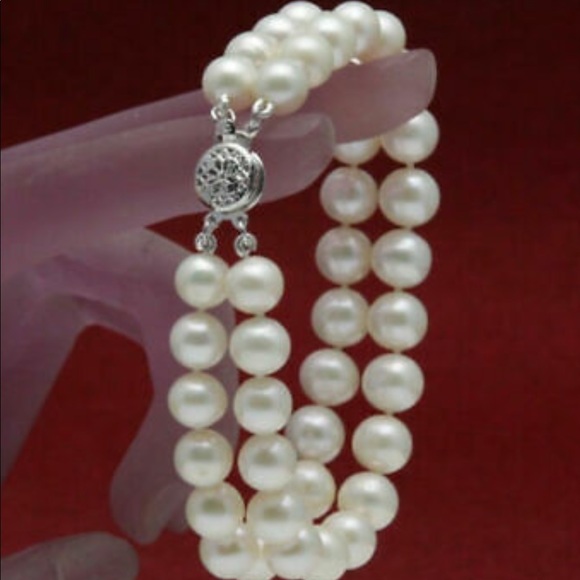 Jewelry - GENUINE DOUBLE STRAND WHITE PEARL BRACELET. Jewelry - GENUINE DOUBLE STRAND WHITE PEARL BRACELET.
